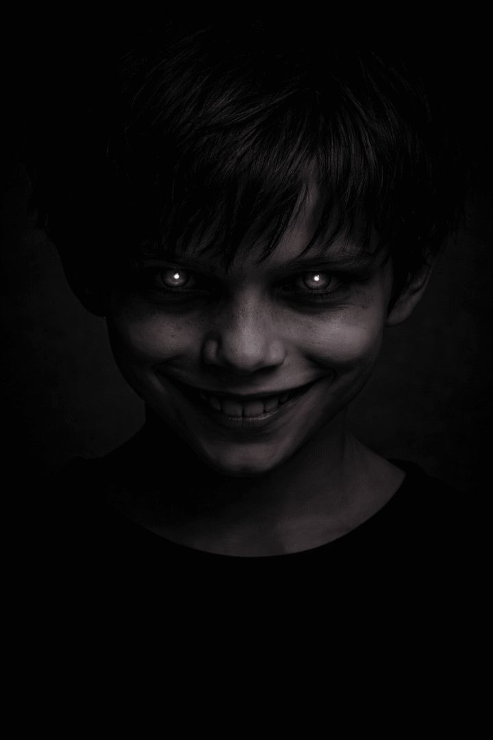 Eerie grin in the dark horror wallpaper